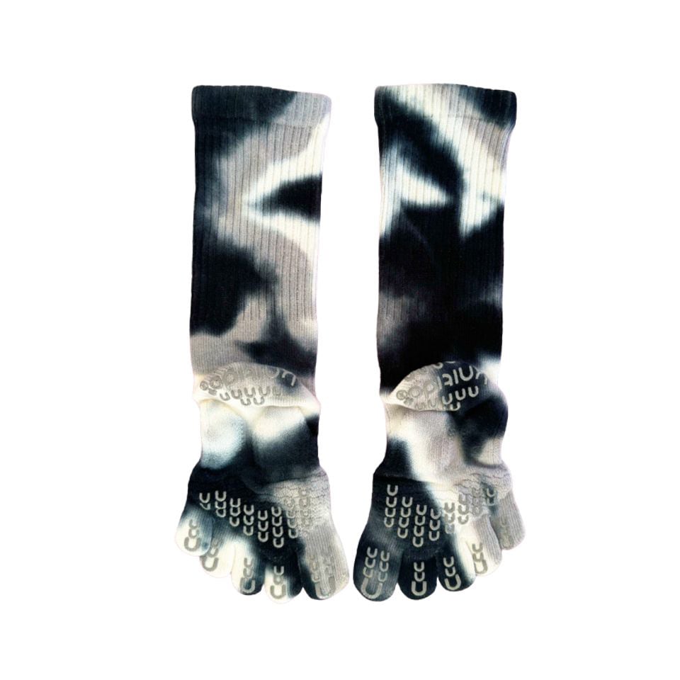 tie-dye five toe socks in gray colors, showing the five separate toe sections and the cushioned sole.