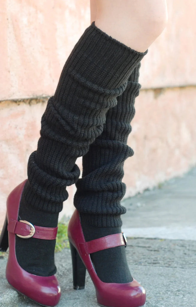 This is a photo of a woman's leg wearing Tabbisocks' product name Scrunchy Over The Knee Lounge Wool Blend Socks.