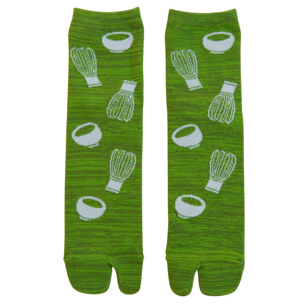 Green tabi socks with bamboo whisk patterns on a white background
