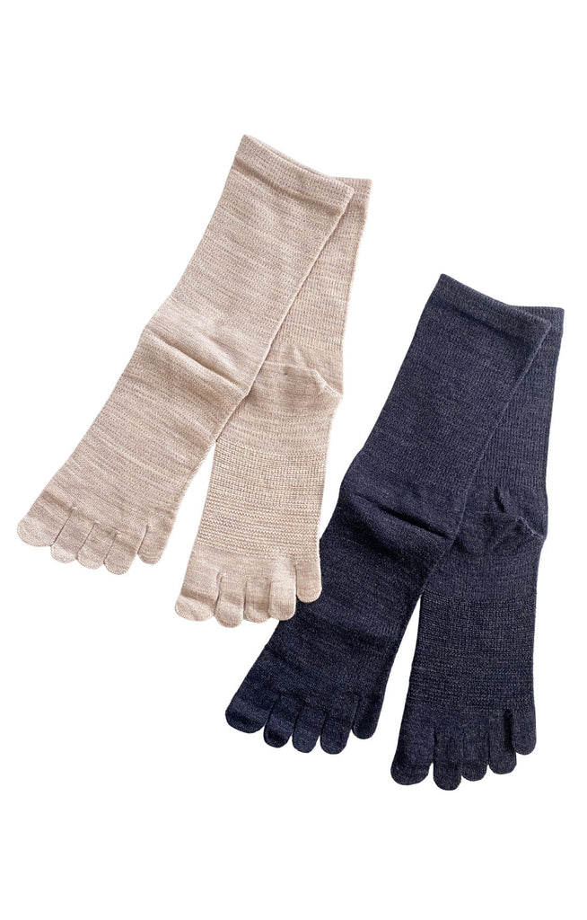 Beige and charcoal gray merino wool toe socks lined up
