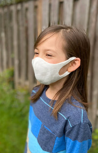Girl wearing Tabbisocks Wellness Organic Cotton Face Mask For Kid-Youth in Ivory