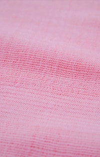 Tabbisocks' Supima Organic Cotton Scarf in Sakura, a light pink color inspired by Japanese cherry blossoms