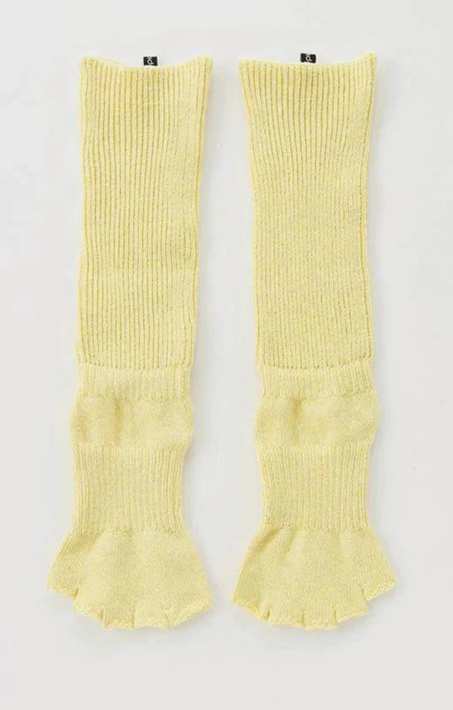 Front side of Knitido plus brand Organic Cotton Botanical Dyed Open Toe and Heel Grip Socks in yellow color