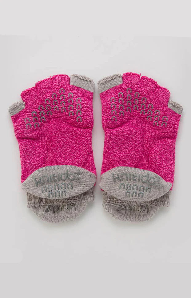 This is a picture of the backside of the brand name Knitido+ product name TWO COLORS OPEN GRIP TOE FOOTIE *POWER PADS* SOCKS in Pink color