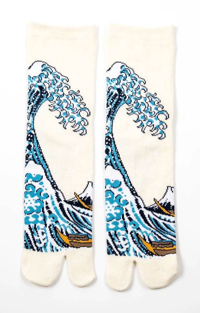 This is a photo of the product name Hokusai The Great Wave Tabi Socks Ivory, which is inspired by a painting by Hokusai Katsushika of Japan by NINJA SOCKS