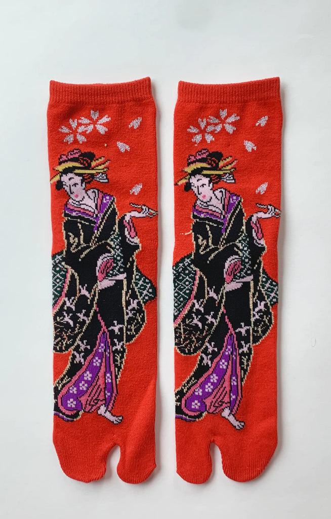 This is a photo of the red color of the product name KABUKI TABI TOE SOCKS of the brand name NINJA SOCKS