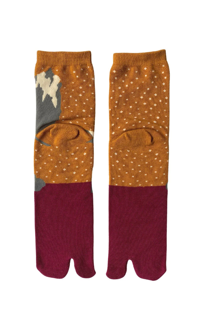 NINJA SOCKS' product name Onsen Monkey Saru Tabi Toe Socks, back view in MUSTARED PINK color with a design of a monkey taking a bath in a hot spring