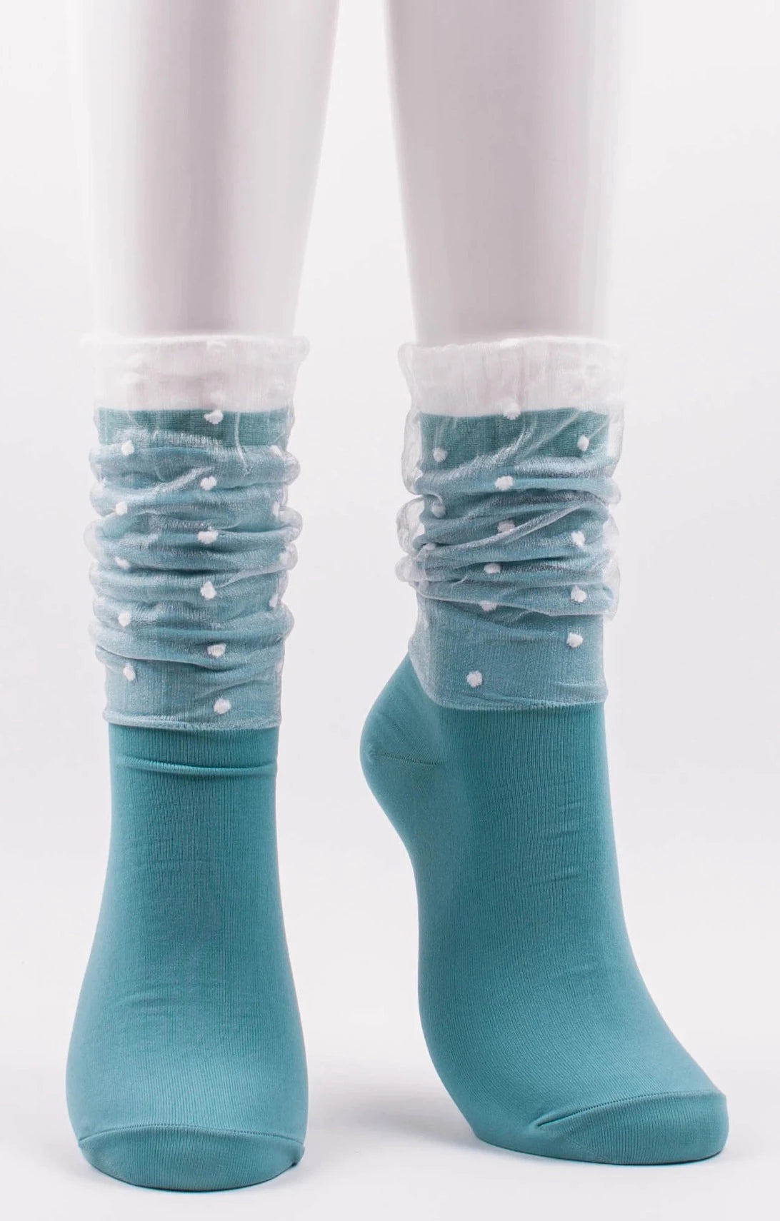 This is a photo of Tabbisocks' product name Dots In Veil Sheer Crew Socks Mint