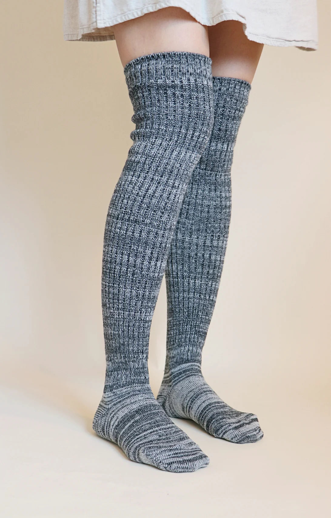https://narasocks.com/cdn/shop/products/Socks-Tabbisocks-Scrunchy-Over-The-Knee-Lounge-Wool-Blend-Socks-Black-White-Heather.webp?v=1701461483