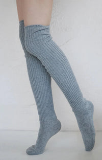 This is a photo of a woman's leg wearing Tabbisocks product name Scrunchy Over The Knee Lounge Wool Blend Socks GREY