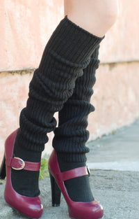 This is a photo of a woman's leg wearing Tabbisocks' product name Scrunchy Over The Knee Lounge Wool Blend Socks.