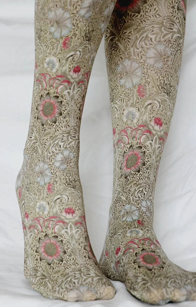 Close-up photo of the calf area wearing Tabbisocks Corn Cockle By William Morris Printed Art Tights
