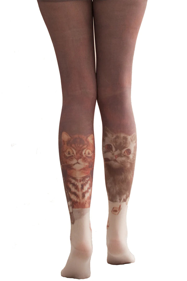 This is a photo of a woman's leg wearing Tabbisocks' product name Louis Wain By Bachelor Party Printed Art Tights Cat Pattern