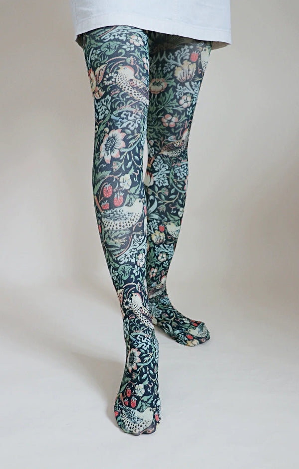 Woman's leg in light blue skirt with STRAWBERRY THIEF by Wiiliam Morris Printed Art Tights