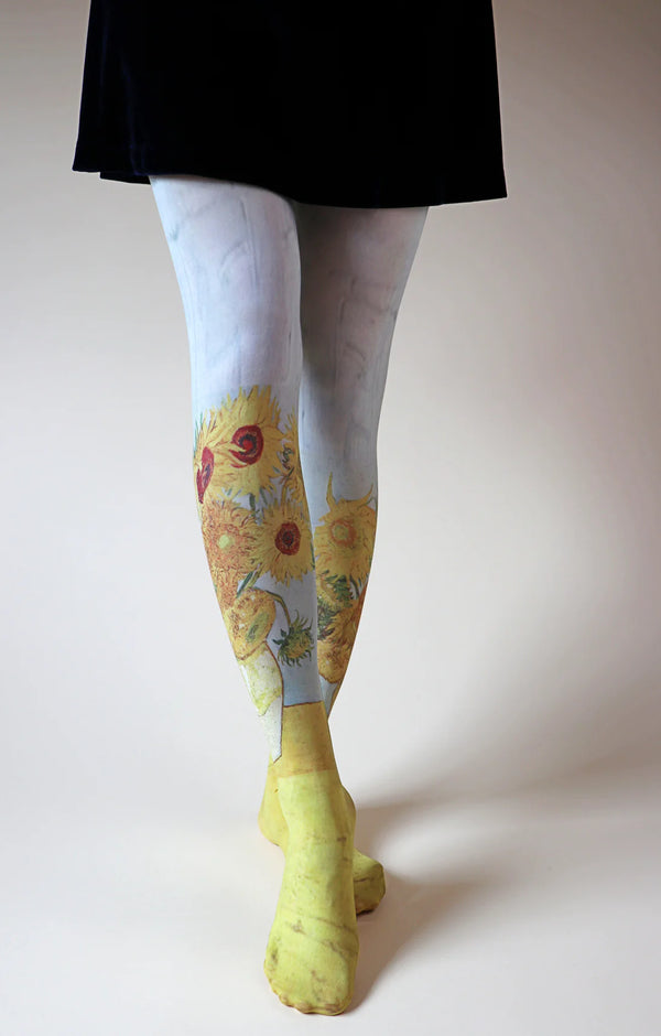Female leg in black skirt viewed from front wearing Tabbisocks SUNFLOWERS 3rd München Version by VAN GOGH Printed Art Tights
