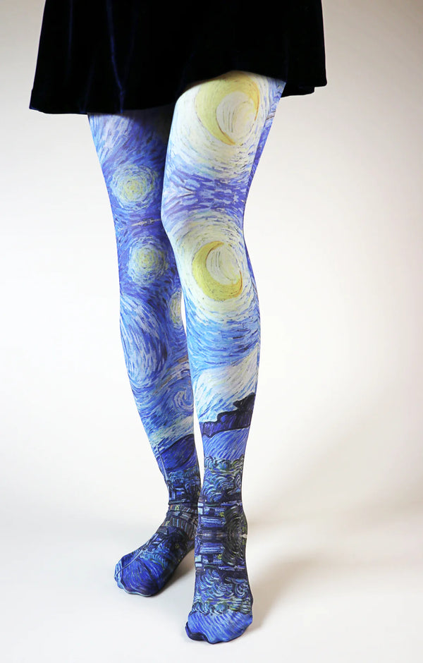 Woman's legs viewed from front in black skirt wearing Tabbisocks Van Gogh By The Starry Night Printed Art Tights